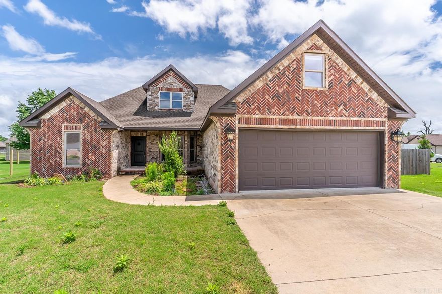 Welcome to Market 216 Hollis in Bono, AR!  This Custom Built 5 bedroom/2.5 bath Brick home has it All! Walk into perfection onto Hardwood floors, gaze upon a Gorgeous custom built wood burning fireplace, a Well-designed Kitchen with Granite countertops, a Breakfast bar, & plenty of cabinet space! But that's not all! This home also offers a Custom Built-in shower, a laundry room, & Dining area. Don't forget the bonus room upstairs (4th bedroom) with half bath; also a Loft above the Garage -with its own heat & cooling unit (5th bedroom). Outside you will find a covered brick back porch with a small sink & grill area with privacy fence!  If this sounds like what you've been looking for call today for your private tour!