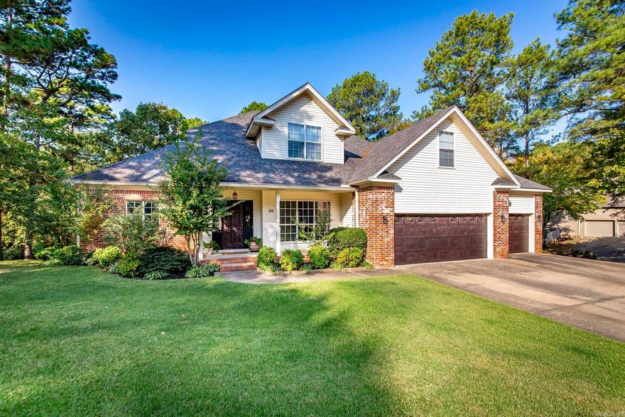 One owner custom built home on corner lot. 1.5 stories brick and siding. 3 large bedrooms/3.5 bathrooms, open floor plan with 9 ft. ceilings. Oversized 3 car garage. Updates include new windows 2024, new paint - trim and deck 2024. SS dishwasher 2024. Hardwood Bamboo floors, carpet, hardware, ceiling fans 2019. Large master on main level with huge walk-in closet and master bath with separate vanities, shower, and jetted tub. Separate dining room. half bath on main level Amazing great room with large brick site built fireplace and gas starter opens to large eat-in kitchen with island breakfast bar, double wall ovens, glass top range with pop up vent, abundant cabinets and pantry for storage. Separate laundry. Upstairs 2 bedrooms and 2 bathrooms - one bedroom has additional sitting area and jetted tub. Large game room and office nook. 2 Walk-in attic storage areas and additional storage underneath house crawl space. Partially fenced backyard.