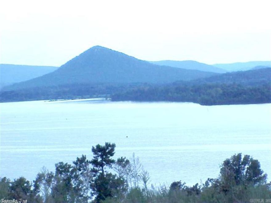 It's here!! Phase II in Mountain Crest Estates. Beautiful Building Site with Majestic views of the Arkansas River and Pinnacle Mountain make the perfect backdrop for your new home. Centrally located to Little Rock, North Little Rock, and Conway make this tranquil escape your own private haven.   Bill of Assurance with a minimum of 2500 sq ft all utilities are underground with streets being paved, curbed and guttered.  Call today for Your Private Showing.  GATED Subdivision.