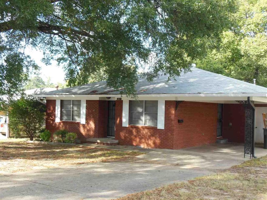 Ideal for roommates or small family. Spacious home with large furnished kitchen, large den/dining combo with sliding glass door to a covered patio,  formal living room (could be used as a 3rd bedroom), 2 large bathrooms, plenty of storage, attic fan, large fenced back yard. Close to shopping, schools & hospitals. Call Marshall Peters & Associates 501-414-8340