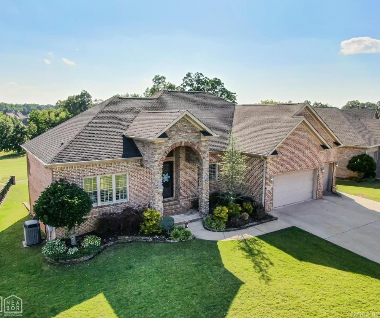 Welcome to 4309 Lochmoor Circle! This home sits on #18th fairway in the Sage Meadows community and is the Brookland school district. You will enjoy amenities like the neighborhood pool, basketball & pickleball courts, & playground! Once inside, you will notice elegant trim work, beautiful built-ins, and decorative ceiling. This home is a must see and while you are here, enjoy your favorite music over the whole home sound system! Some upgrades that have taken place include a new roof in October 2022, new paint, new modern light fixtures, LED bulbs throughout interior & exterior, remodeled primary bathroom, new marble countertops, new flooring and backsplashes, fiber internet and so much more! This home has 4 bedrooms, with each having its own bathroom! No more fussing over a shared bathroom! Some extras include a large balcony overlooking the backyard and fairway, irrigation system, movie theater, walk-out basement, and two extra rooms for an office and/or workout room. An added bonus is a heated and cooled workshop area to house all of your tools, yard equipment, or multiple golf carts.