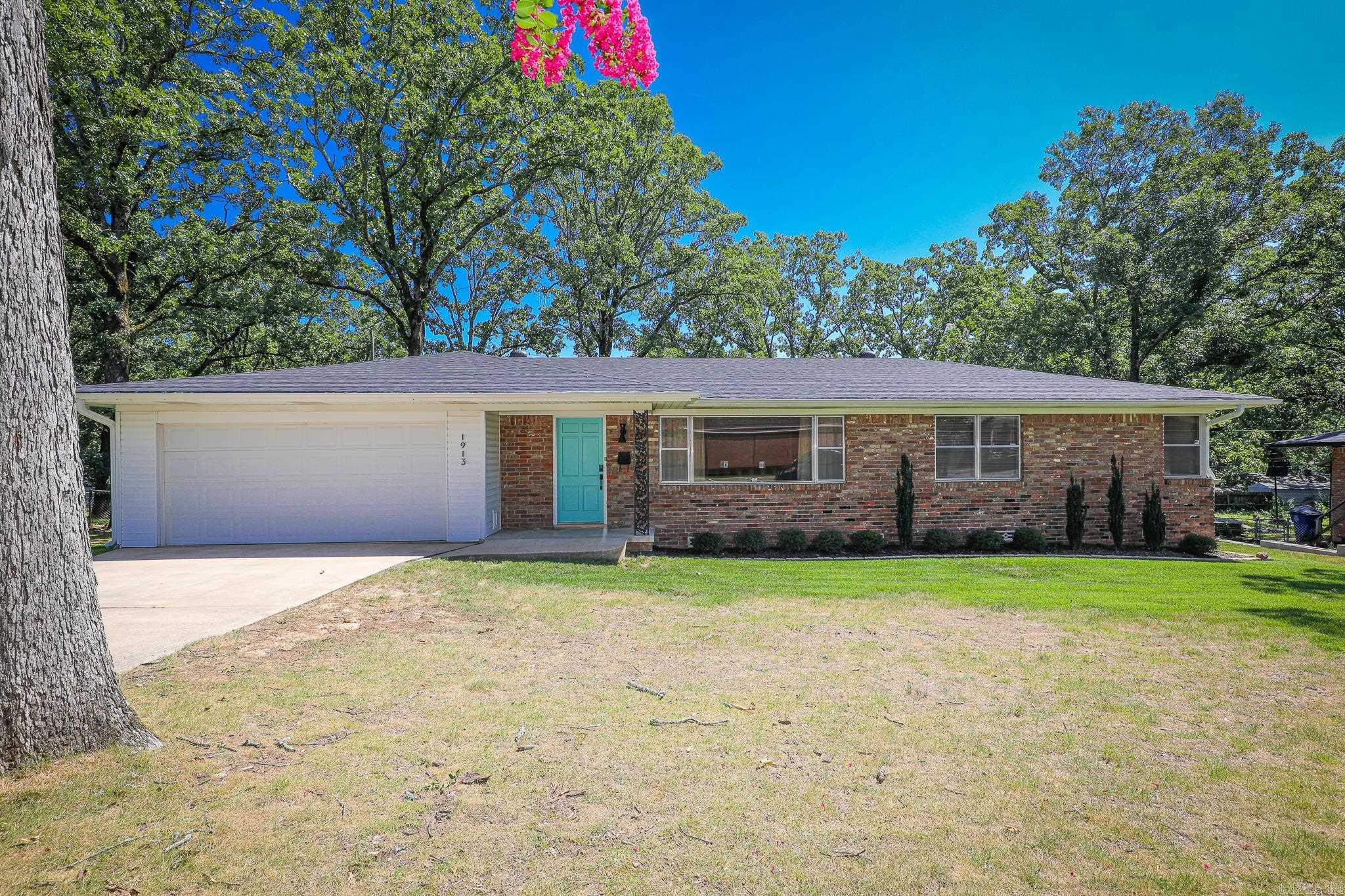 So very well cared for, updated, and more than move-in ready! Large living area with a picture window that provides loads of natural light. An additional combination living/dining area. Renovated kitchen with a gas cooktop, granite counters, tile backsplash, farmhouse sink. Separate laundry room. Screened in back porch. Beautiful hardwood floors throughout excluding the wet areas. New roof and gutters 2023. All this plus a two car garage! This one will not disappoint.