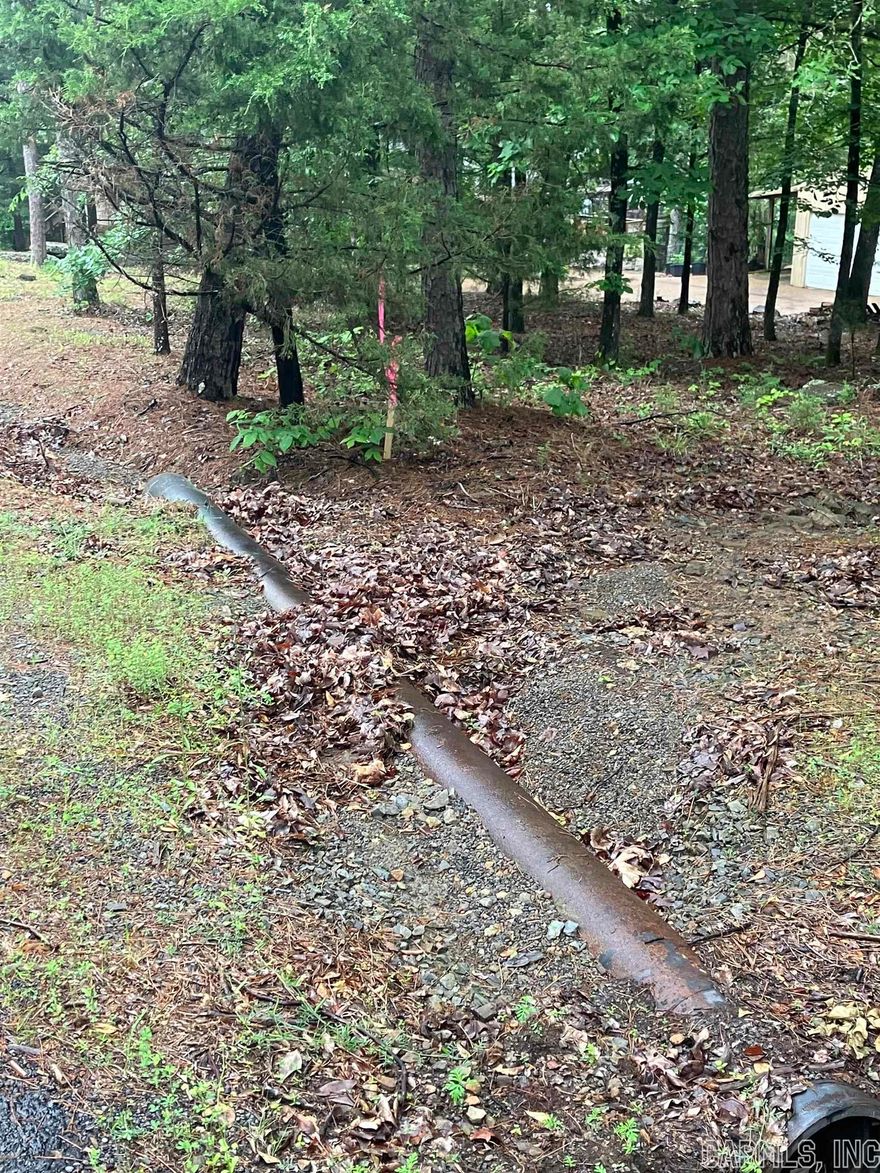 Gorgeous & peaceful neighborhood! Great location! Ready to take the first step in making your lake home dream a reality? Great neighborhood for a full time home as well! Take a look at this beautiful lot! Utilities are not on the property but are by the property! Lot has been surveyed & is being Perked.. This lot won't last long.