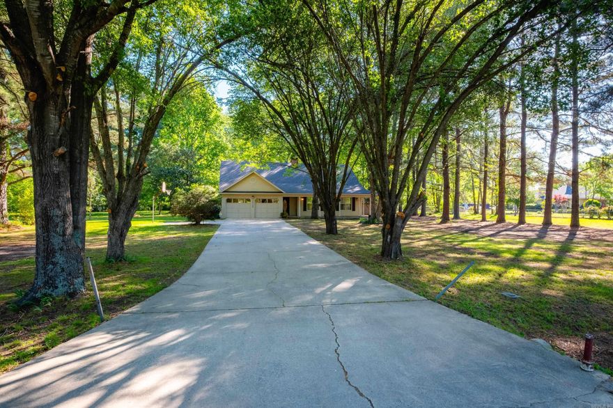 Welcome to your private retreat in the highly sought-after area of Roland! Situated on just over 2 beautiful, flat acres, this fully remodeled 1,900 sq ft home offers the perfect blend of modern updates and peaceful country living. Step inside to discover a move-in ready home featuring new paint throughout, updated lighting, Luxury Vinyl Plank with Engineered wood floors. The completely renovated kitchen is a showstopper, boasting sleek quartz countertops, stylish tile backsplash, and all-new finishes—perfect for both everyday living and entertaining. Both bathrooms have been tastefully updated with stunning new tile showers, giving the home a clean, modern feel from top to bottom. Pride of ownership shows in every detail—this home is truly in immaculate condition. Located on a quiet dead-end street, you’ll enjoy privacy and minimal traffic in one of Roland’s most desirable areas. The property includes two parcels, offering incredible flexibility and future potential. Whether you’re dreaming of building a second home, constructing a shop, or installing a pool—there’s plenty of room to make it happen. This home checks all the boxes!