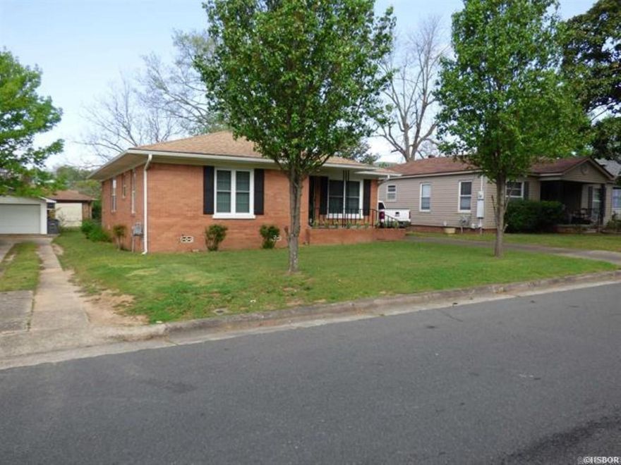 The classic brick facade welcomes you with its enduring charm. The mature trees and well-maintained landscaping add to the curb appeal. A one-car garage provides convenient parking and extra storage space. This home combines the best of classic design, comfort, and practicality. Don’t miss the opportunity to make it yours! 3 bedrooms 1 and a half baths, hardwood floors, updates throughout!