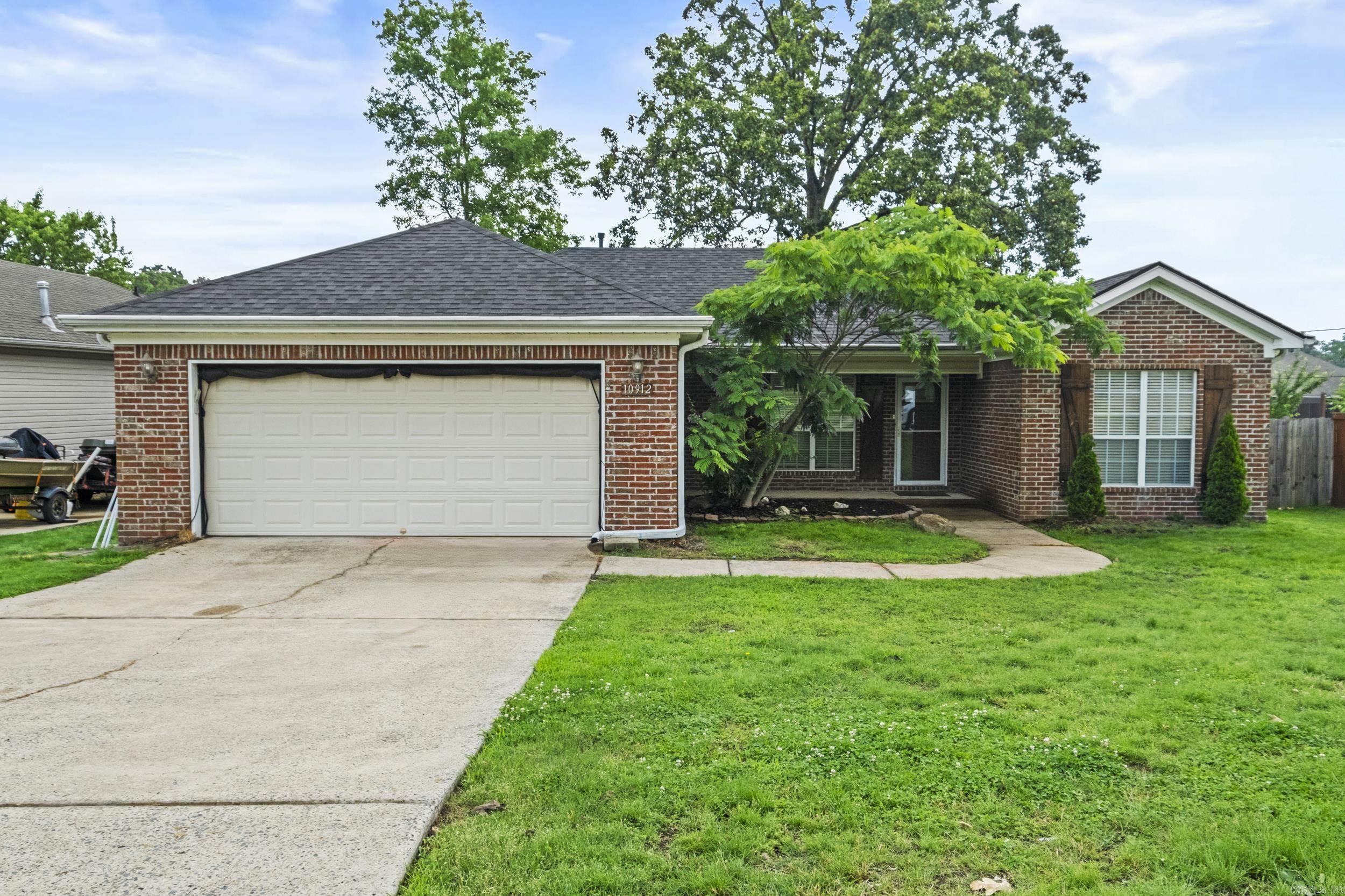 Check out this 3 bedroom/2 bath split floor plan. Primary bath has walk-in shower and tub with large closet. Home features a corner fireplace with lament flooring throughout. Kitchen has a nice pantry, gas stove and freshly painted cabinets. Small office space off of kitchen and laundry room. Garage door has a roll down screen. Morgan building in backyard conveys. New Roof installed May 2025. HVAC is 3 years old. All within walking distance of Sylvan Hills High School and about 5 miles from the back gate of Little Rock Air Force Base.