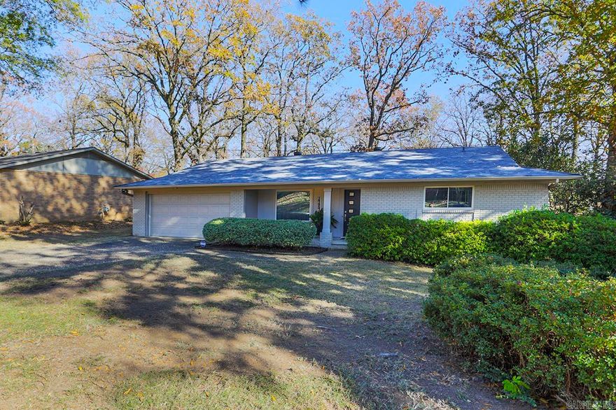 Updated, brick one level near Lakewood lake #3. Three BR, two Bath with beautiful kitchen open to dining and living area. Kitchen has granite countertops, stainless backsplash and new stainless appliances. Home was renovated in 2010 and Seller has continued to renovate since purchase. New roof, paint, carpet, appliances, interior and exterior doors, deck, and updated baths. Backs up to Lakewoood Lake. Direct access to walking trail. Fenced backyard and a small deck. Seller has taken great care of this one!