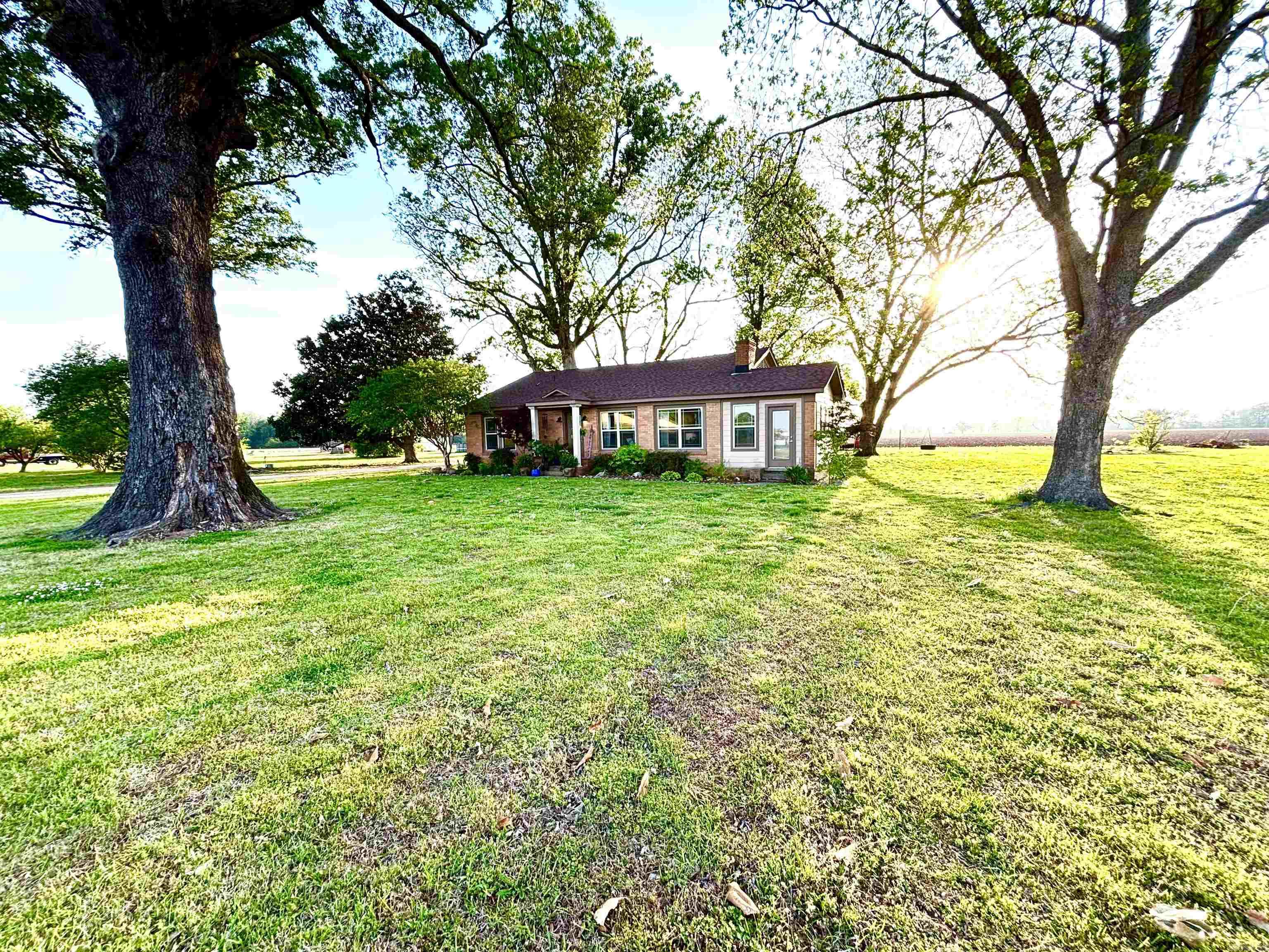 If you’ve been waiting for the perfect rural property to come along…HERE IT IS! Peaceful country living at its finest! This 1956 sq ft home has 3 bedrooms 2 full bathrooms and an office. Stunning tongue and groove ceilings greet you as you enter the front door as well as original hardwood floors. Arched entries, tons of natural light and a spacious kitchen with island is just a few of its charming features. There’s even a breakfast area that overlooks the beautiful backyard. Mature trees provide plenty of shade and a breathtaking view. Storage won’t be a problem with the detached garage/shop and barn. It truly is one of the most peaceful locations you will find in Southeast Arkansas.