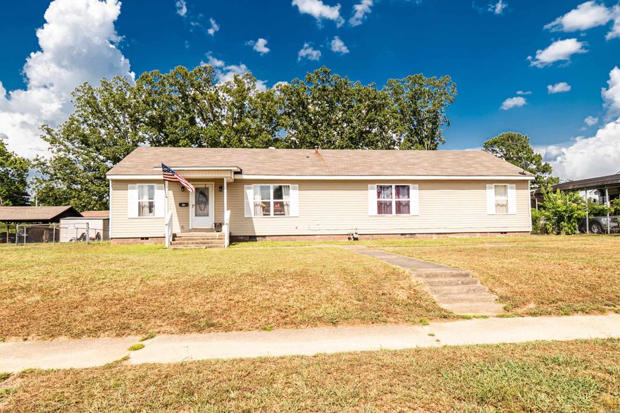 This charming 3 bed, 2 bath property offers 1,943 sq. ft. of living space with a spacious open layout that connects the living, dining, and kitchen areas—perfect for everyday living or entertaining guests. The interior has been refreshed with updated paint and features three generously sized bedrooms. The primary suite includes a walk-in closet plus additional smaller closets ideal for shoes, coats, or extra storage, and the attached bathroom offers both a tub/shower combo and a separate stand-up shower. Outside, enjoy a large backyard enclosed by a chain-link fence with convenient alleyway access to the back of the home. A detached 18x20 outbuilding and a 12x12 utility shed provide plenty of space for tools, hobbies, or storage. This is an heir property, so a seller property disclosure is not available, and while the seller will not make any repairs, buyers are welcome to complete any inspections allowed within the terms of their contract.