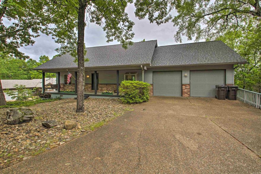 Amazing investment opportunity. Nearly half an acre waterfront with boat dock. Currently a nightly rental with proven track record. This property has character throughout. From the moment you walk in you are greeted with vaulted ceilings and extensive wood trim and accents. The main level includes your primary bed and bath and rooms for relaxing and entertaining. Additional bedrooms and family gathering areas up and down. Perfect for multi generational gatherings or large friend groups. Being sold fully furnished. Call for rental records which include bookings through this fall! Looking for a new home for just you, no problem.  Bookings go away and you can make your dream of lake living a reality! Bonus with this home is all the extra storage areas, perfect for a large workshop and/or  room to add additional bed and bath if desired. See Agent remarks.