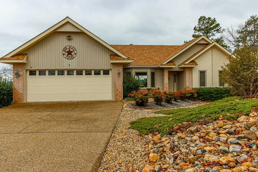Beautiful view of Lake Balboa and the mountains beyond  - in excellent condition and all on one level. The kitchen has been updated with granite counter tops and smooth surface range.  Large utility room plus a large heated and cooled work shop on the lower level. Located on a cul-de-sac with a level drive, a fantastic view to the south and a nicely landscaped yard.
