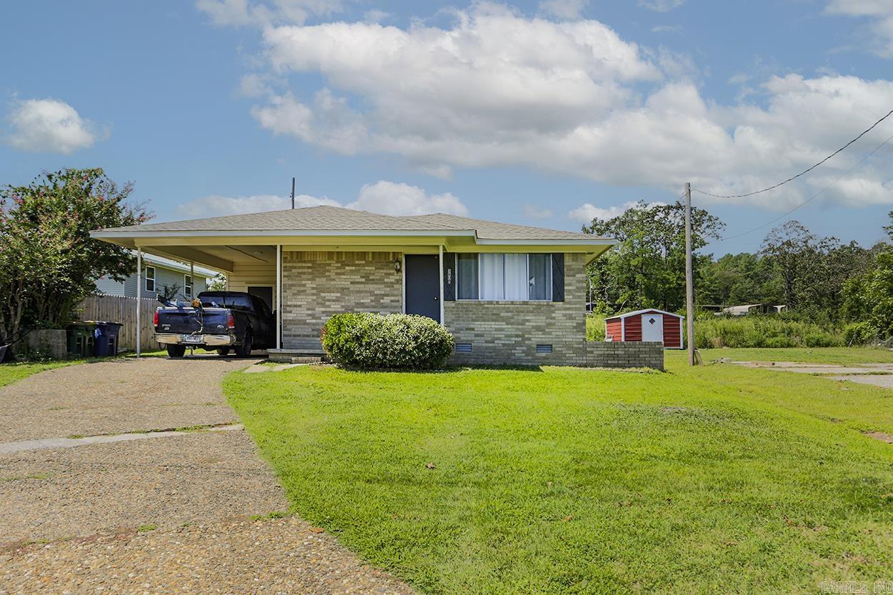 Investors!! Don't miss this brick one level in convenient location! 3 bedrooms/1.5 bathrooms with hardwood floors, separate dining area, and large living area. Remodeled full bathroom with tile shower. Screened porch and one car carport. New roof in 2023. Refrigerator and stackable washer/dryer convey. To be sold as is but inspections welcome. Home is currently tenant occupied with a long term tenant that would like to continue renting. Please send preapproval letter prior to showing. Agents, please see confidential remarks.