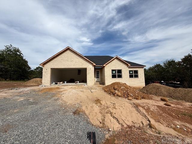 Great plan! Has a large living room with lots of windows open to the kitchen. Electric fireplace is great focal point on the wall. Nice sized island in the kitchen with cabinetry in the island. Big pantry! Electric fireplace. Primary bedroom has box ceilings for extra height. Guest rooms are separate from the primary bedroom. Tile showers in bathrooms. Separate laundry room Has a nice yard with trees. The backyard is private with woods behind the home. Fantastic porch across the back of the home.