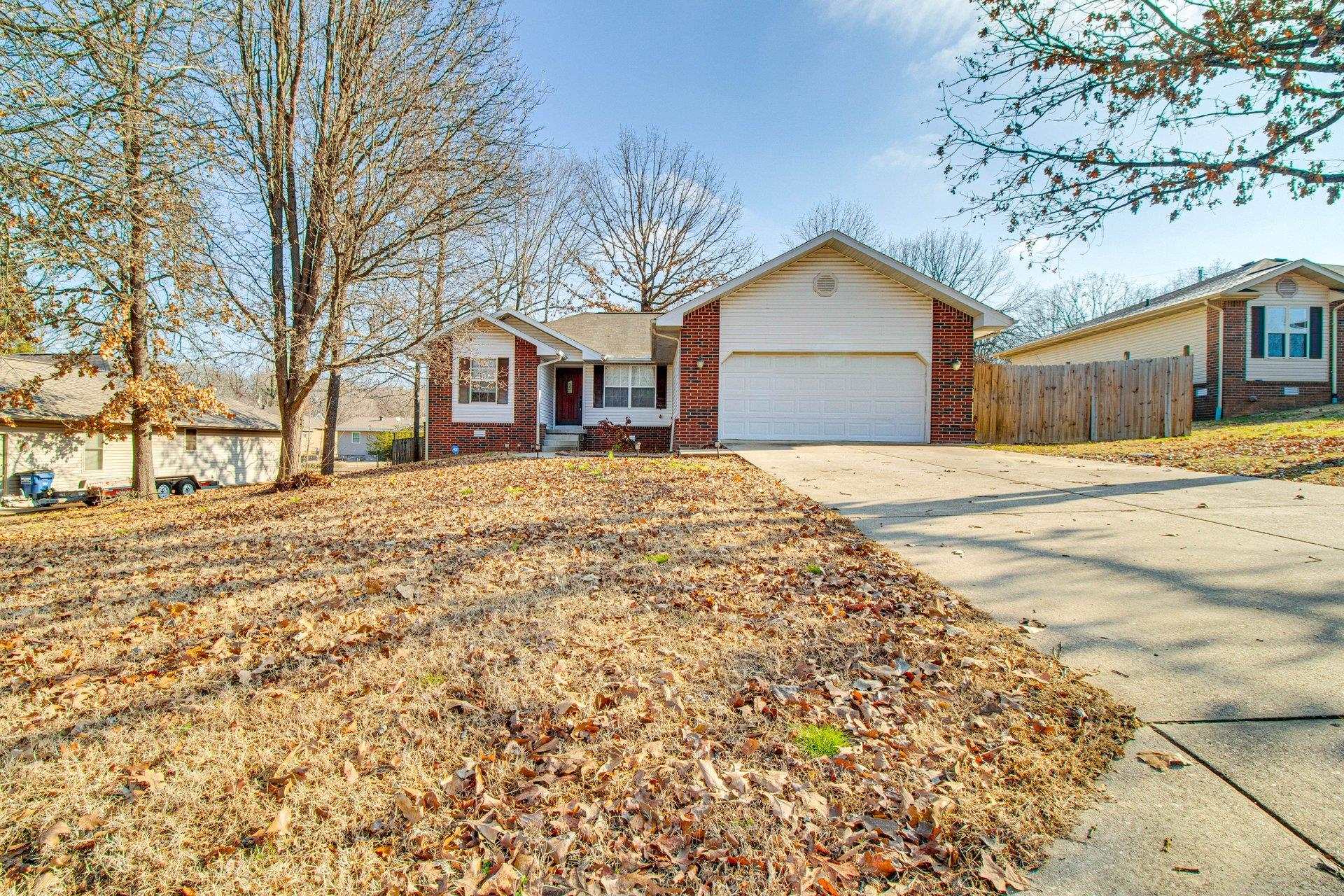 Tucked into a clean, quiet neighborhood in the heart of Mountain Home, this charming 3-bed, 2-bath home offers the best of both worlds—peaceful country living with all the perks of in-town living. You'll love the modern comforts of city utilities, paired with the friendly, laid-back atmosphere that makes Mountain Home such a special place to live. Whether you're a full-time resident, seasonal visitor, or savvy investor, this turn-key ready home checks all the boxes. Recently used as a fully furnished short-term rental, the home is in excellent condition. The layout is practical and inviting, with plenty of natural light and cozy living spaces that make you feel right at home. Located just minutes from Norfork Lake, local shopping, restaurants, and the city hospital, you’ll have everything you need close by!. If you're looking for comfort, convenience, and a touch of rustic charm, this Mountain Home beauty is ready to welcome you.