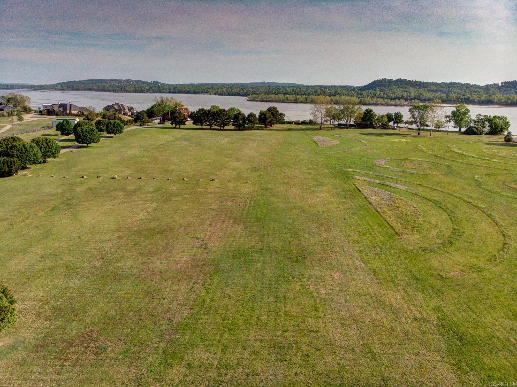 Beautiful River Frontage. Level 5.64 acres of River Lot with 217.85 of River Frontage Wonderful home site that is surrounded by beautiful homes and close to Two Rivers Park.