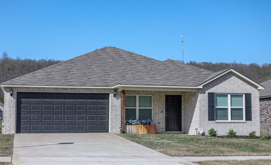 Four bedrooms in Conway city limits (Conway Corp) for an incredible price!  This all-brick home boasts an open floor plan and split floor plan, perfect for living and entertaining. Step into the stylish kitchen featuring stainless steel appliances and pristine cabinets, counters, and upgraded sink. Extra hall closets give you the perfect amount of storage, and the installed alarm system will keep you at peace when away.   Situated only a few minutes from tons of shopping and I-40, you will have the luxury of getting anywhere you need to be in a just a few minutes.    Don't miss the opportunity to grab this home! It will go fast!