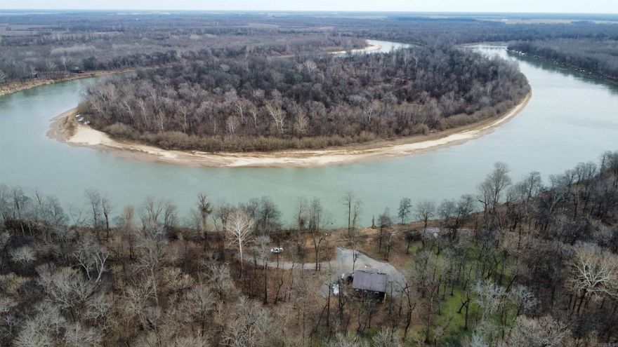 Location is everything when it comes to truly special hunting properties, and this offering stands in a class of its own. Known as Wolf Lake Lodge, this 40+ acre legacy tract is bordered on three sides by Hurricane WMA and anchored on the fourth by the legendary White River, providing unparalleled access to over 17,000 acres of premier bottomland, waterfowl habitat, and trophy deer hunting.  The property features a 3-bedroom, 1.5-bath lodge overlooking the banks of the White River—an ideal base camp for generations of outdoor tradition. When the river is up, the duck hunting is exceptional, with immediate access to vast expanses of green timber and river-bottom habitat that few properties can offer.  This is a rare opportunity to own a piece of Arkansas hunting heritage, offering seclusion, unmatched access, and the kind of setting that becomes a family legacy rather than just a property.