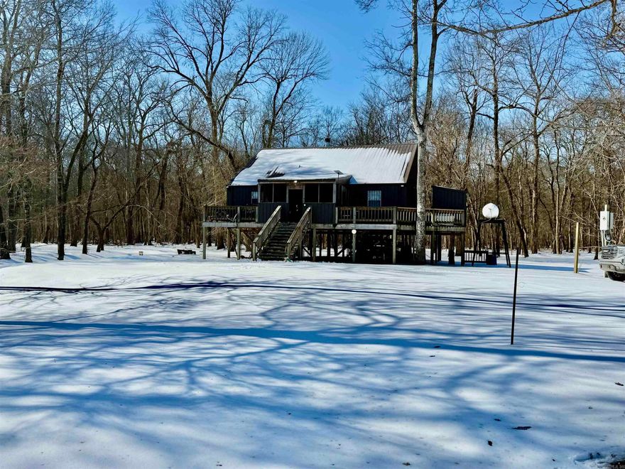 Location is everything when it comes to truly special hunting properties, and this offering stands in a class of its own. Known as Wolf Lake Lodge, this 40+ acre legacy tract is bordered on three sides by Hurricane WMA and anchored on the fourth by the legendary White River, providing unparalleled access to over 17,000 acres of premier bottomland, waterfowl habitat, and trophy deer hunting.  The property features a 3-bedroom, 1.5-bath lodge overlooking the banks of the White River—an ideal base camp for generations of outdoor tradition. When the river is up, the duck hunting is exceptional, with immediate access to vast expanses of green timber and river-bottom habitat that few properties can offer.  This is a rare opportunity to own a piece of Arkansas hunting heritage, offering seclusion, unmatched access, and the kind of setting that becomes a family legacy rather than just a property.