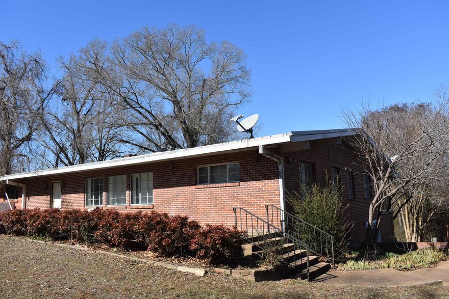 Old house built to withstand fire and tornadoes. The house is not the value of the property. The land is where the value is. Great development potential. The info on the house is estimate. It seems much bigger than 2800 sq. ft and many rm can be bedrooms.