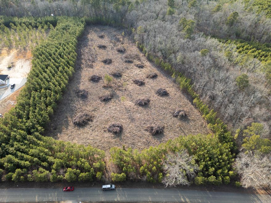 Discover the perfect spot for your dream home right off the Haskell exit in this highly desirable area. Tucked away in a private and peaceful setting, this 8.30-acre lot offers the ideal blend of seclusion and convenience. With the land already cleared and utilities on-site, you can start building your custom home without delay! (1800 sq. ft min. No mobile homes.)