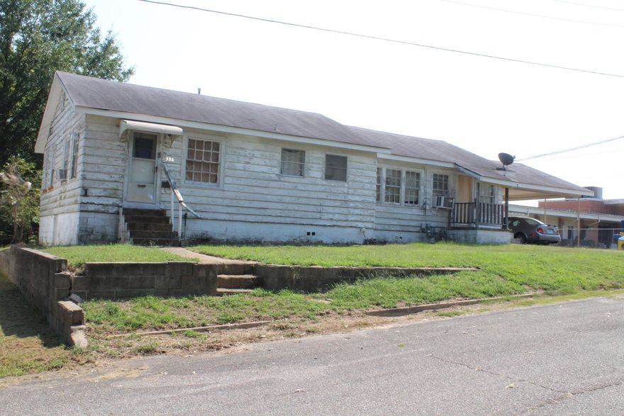 1608 Sq. Ft. Duplex, one side has 3 Bedroom, 2 Baths and the other side is a Studio Apt.  Roof is 5 years old.