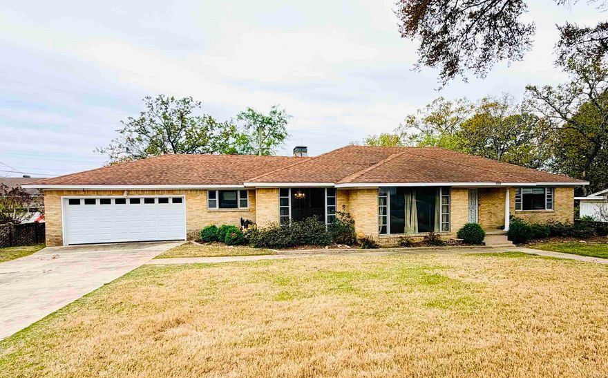 Charming all-brick, one-level home in the heart of Park Hill in a great location with easy access to I-40. This home features a fully fenced backyard, beautiful hardwood floors throughout most of the home, and two open living areas.  There is a formal dining space and an eat-in kitchen. The updated kitchen offers a chef’s 6-burner gas range, stainless dishwasher and microwave and granite countertops. The primary bathroom has also been updated with a walk-in shower. One of the living areas includes a cozy gas-log fireplace. Outside, enjoy a private backyard with a large deck and views of downtown Little Rock and the Arkansas State Capitol. AC was replaced in 2022.  There is a 2-car garage with extra storage.  Refrigerator, washer and dryer convey. Home to be sold AS IS with no repairs and no seller disclosure.
