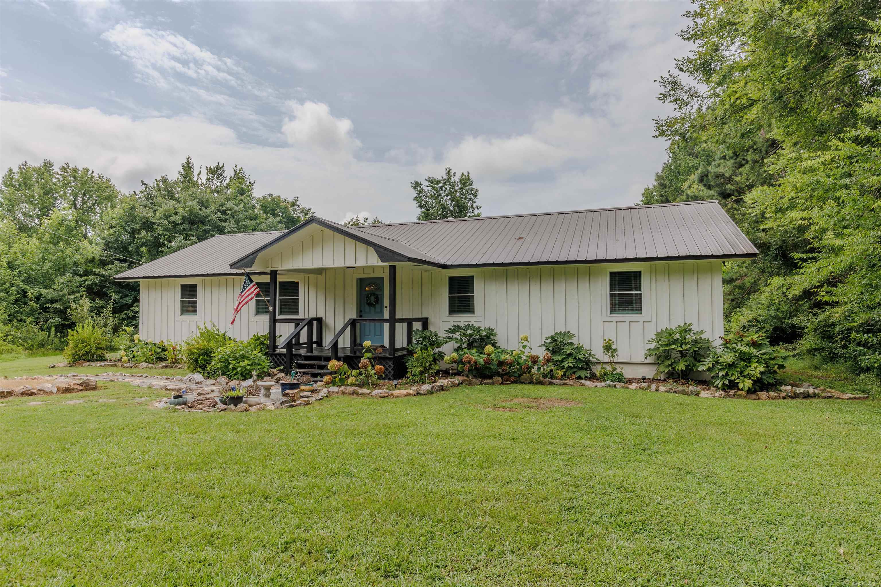 This charming country home has been fully remodeled, with acute attention to detail throughout. The property itself sits on 2.66 unrestricted acres. Perfect for starting your homestead or just moving out of the city for privacy. Inside you will find 3 bedroom, 2 bathrooms, an office plus an additional flex room off the large laundry room! The inside of the home has many new items - paint, floors, cabinets, countertops and so much more! Outside the home features a metal roof (2019), new windows (2021), new HVAC duct system (2021) and immaculate landscaping! This home is truly move in ready for its new owners! Enjoy being minutes from Perryville, where you have access to restaurants, grocery store, bank and the town square. Work from home? No problem. This property offers fiber internet through Connect2First! This property also qualifies for USDA Rural Development 0% down payment loan. Contact your preferred lender for qualification details.