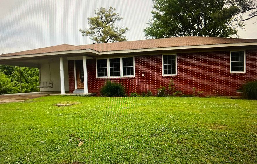 Nice house on 1.84 acres in town