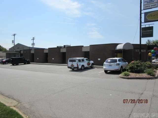 Iconic building on JFK Blvd and East E Avenue in the heart of Park Hill. Excellent location and facility for retail or quiet office for investment purposes or owner/occupant. Existing sign conveys in front. Currently 50% occupied with leasehold tenants. 14 dedicated parking spaces on North side of property.