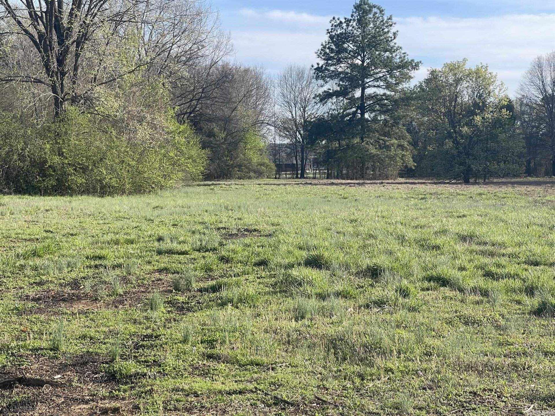 PRIME LOCATION. High Traffic area. Across the street from Luxury Living.   Within 1.5 Miles from Downtown, Sams Club, Home Depot and the new Community Center!!!  ***************** COMMERCIAL or COMMERCIAL + PUD *****************  Access to ALL Utilities.   The House has new subfloors and needs flooring.