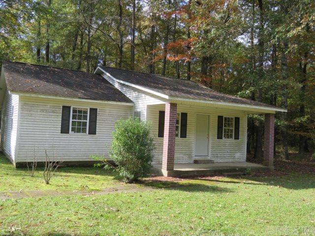 Check out this home! It's on 5 level acres partially wooded with wild life. It features an island in the kitchen, a storm cellar and a shop or outside storage. It has a large front porch. This property is sold as is.