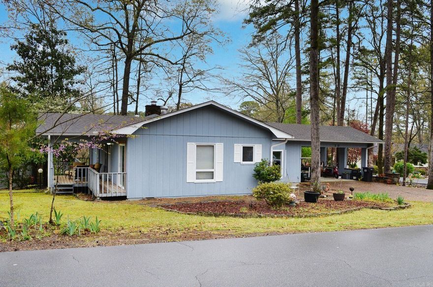 This charming home is on a corner lot with common property on one side. Located at the West End of Hot Springs Village, you are close to many restaurants, shopping, and other amenities such as pickleball courts, an outdoor pool, Lake Desoto, miniature golf, and Desoto Beach. A short ride in your golf cart takes you to Desoto Golf course and restaurant (if you don't have a golf cart, the homeowner's golf cart is for sale). Home has a workshop or hobby room in the crawlspace. Hot Springs Village has nine golf courses, 11 lakes, pickleball & tennis courts, a fitness center, and 28 miles of hiking trails. Hot Springs Village has a one-time buy in fee of $2,000 paid at closing.