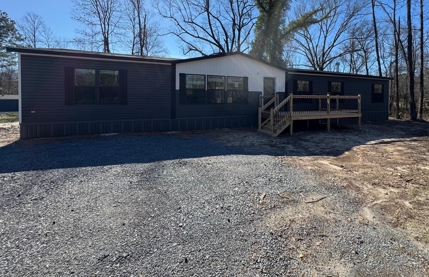 This new Manufactured home is being built on over 3 acres. Nice area and close to everything. Home is on a permanent foundation and FHA approved.