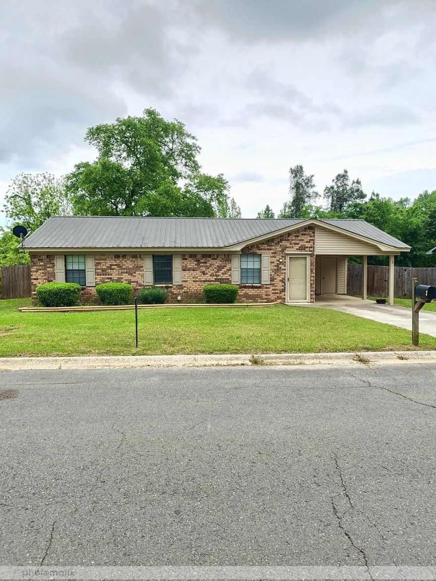 This lovely single-family home is move in ready! The brick exterior and covered carport offer a charming curb appeal. The property features 3 bedrooms and 1.5 baths. It also has a nice sized backyard that provides ample space for outdoor activities.  A great option for first-time homebuyers or those seeking a comfortable, affordable home.