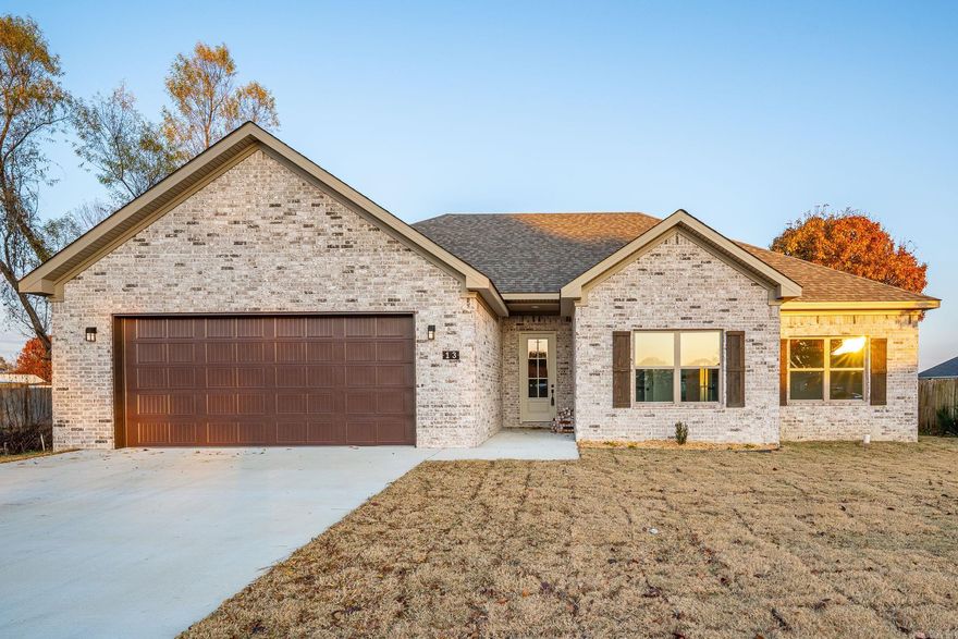 New Construction in Vilonia! This beautiful all-brick home offers a thoughtfully designed split floor plan and stylish, durable finishes throughout. Enjoy Coretec Luxury Vinyl Plank flooring throughout, quartz countertops, a modern electric fireplace, and Delta plumbing fixtures for a polished, high-quality touch. The primary suite features a spacious custom tile shower and a relaxing soaker tub, while all bedrooms offer comfort and flexibility. Built with energy-efficient features including high-performance windows, insulation, and HVAC to help lower utility costs. With an open layout, spacious garage, and plenty of natural light, this home combines comfort, efficiency, and style — plus a huge, fully fenced backyard perfect for outdoor living in a desirable Vilonia neighborhood.