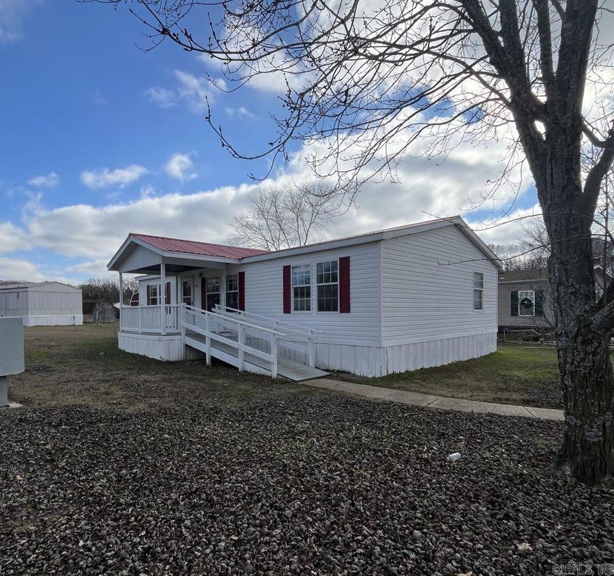 Looking for a mobile home in a well-maintained park?  This move in ready mobile home is a 3 bed, 2 bath double wide with a split bedroom plan. New Carpets, New back door. Open Living, spacious primary with garden tub and shower. Nice covered front porch. Storage shed stays! What a great deal – this one will not be on the market long!