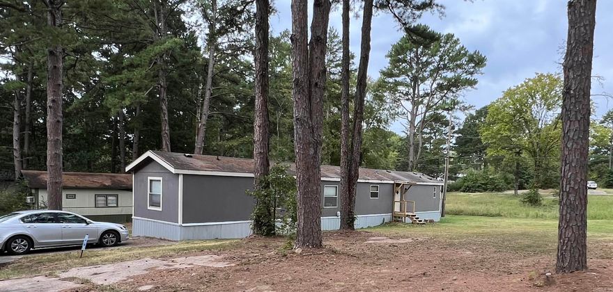 This manufactured home has undergone a major renovation in the past year. Large open kitchen and living room. New appliances; new soaker tub in master bath. Two new decks at front and back doors; new sewer lines. This home is move in ready!