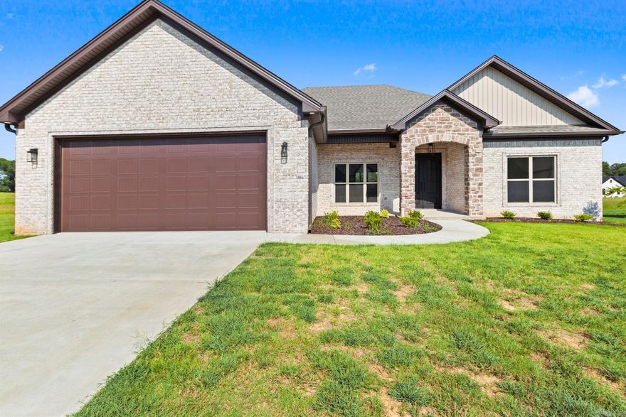 Gorgeous 4 Bedroom 2 Bath with Beautiful curb appeal, from the Rock Accents to the Black Iron Front Door to the stunning wood work under the front and Back porch. Welcome in to this open floor plan, Huge LR Area with large Rock Fireplace that will include vent-less gas logs. If cooking or baking is your thing you will love this Chefs Kitchen with an amazing Island toped with Beautiful Quarts Counter tops. But the true stunner in this home is the Master Bath and Closet area.  Master and 1 other Bedroom is on one side of the home, 2 other nice size bedrooms with a great quest bath is on the other. But don't forget an amazing Laundry room with Laundry sink and a mud bench right outside to hide those kiddo's Back packs to grab on the way to the garage. This house has so much to offer including lots of storage and some gorgeous finishes. Enjoy and entertain on the Huge back covered patio that includes tv outlet and over looking a nice size back yard. All you will have to do is move in Gutters  are already installed and Fence is coming. PLEASE SEE AGENT REMARKS Also a couple of the photos have Virtual Staging added.