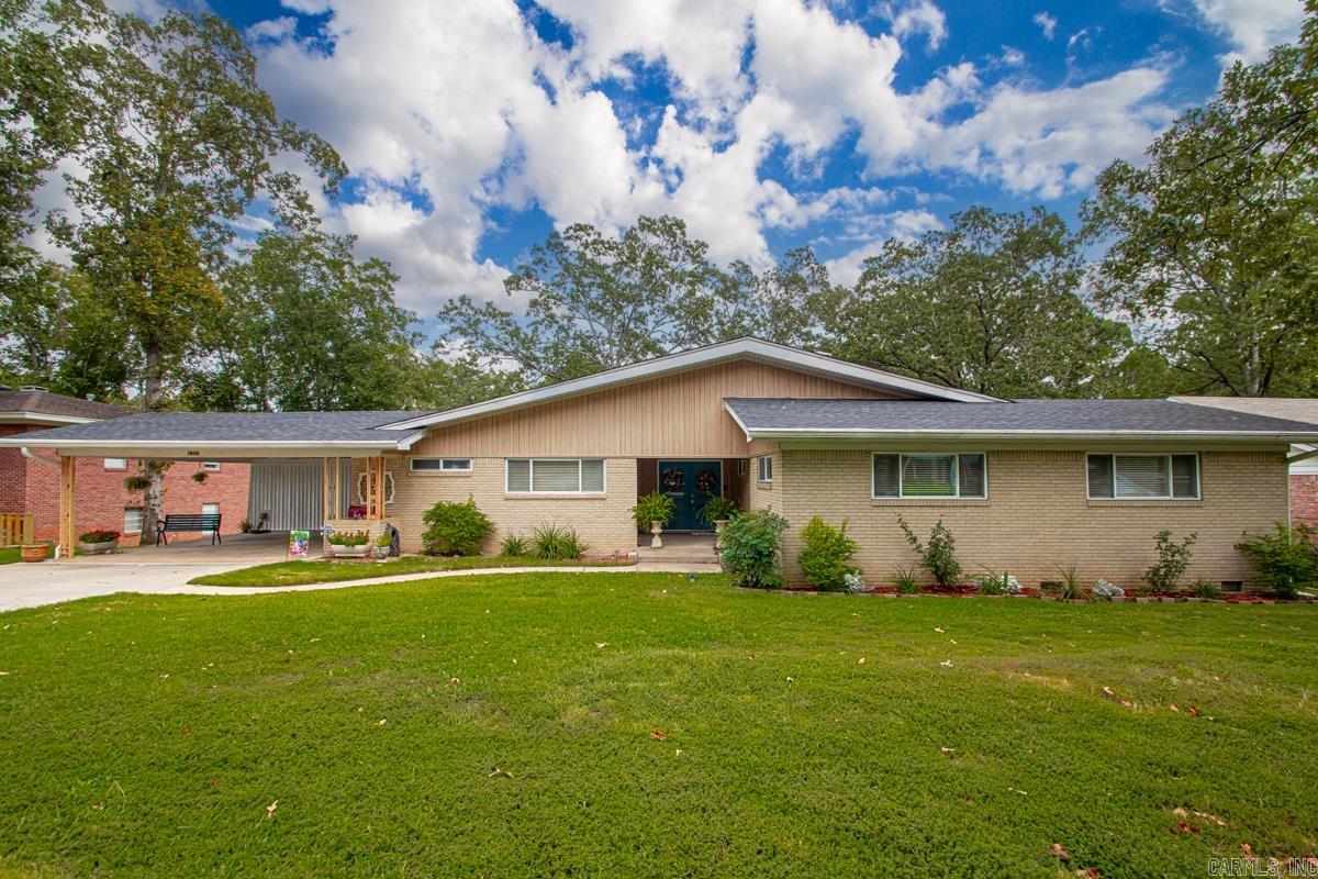 Welcome to this lovely, updated home in the beloved Lakewood neighborhood! Walking distance to parks, lakes, schools - you are truly in the heart of it all! Property was remodeled in 2021 featuring all new kitchen, baths, wood floors, light fixtures, paint, driveway (made bigger), fireplace surround, front doors, plumbing, electrical, hot water tank, and more! Roof replaced in 2022 making this home move in ready and low maintainance for years to come. There is a large storage space under the home with concrete floors and electricity that could be a shop, christmas storage, home gym and more. You have to see this one in person to appreciate all it has to offer!