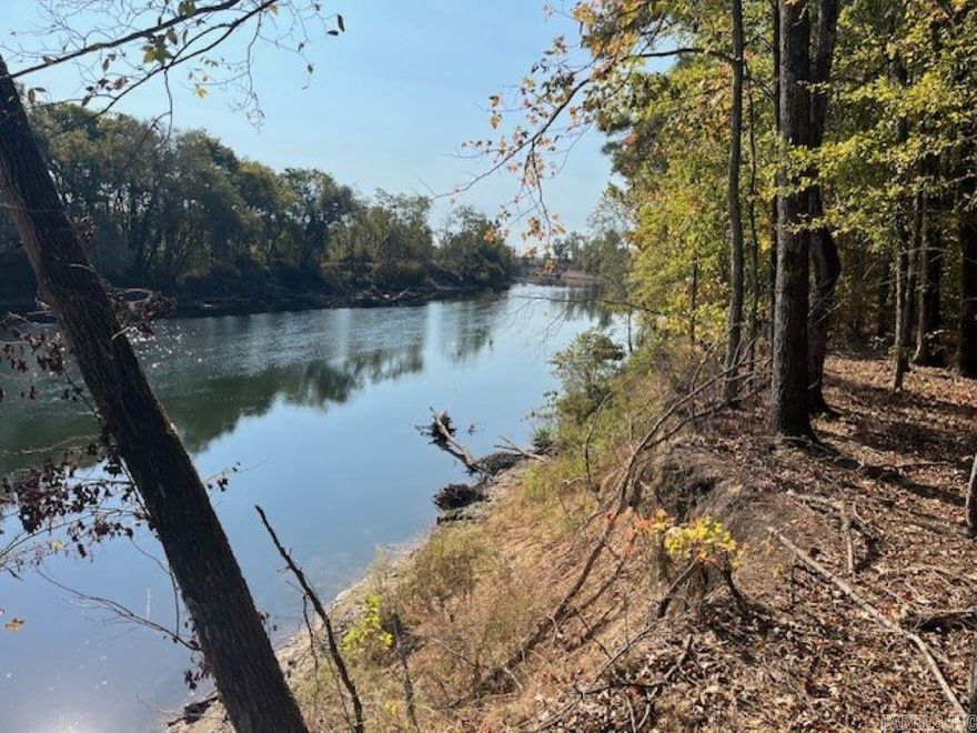 Ouachita River lots with county road access along Open Banks Road.  Municipal water, electricity, and fiber internet access at road add to the enjoyment of the property. Less than 8 miles and 15 minutes south of Arkadelphia.  Survey pending, no deed restrictions or covenants. Lot 1 totals 3.5+/- acres.