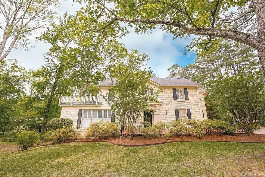 Welcome to 2316 N. Calion Rd. – where Southern hospitality meets colonial charm on 2.77 acres of picturesque city living! This gracious 4-bedroom, 3-bathroom home welcomes you with open arms, offering a perfect blend of timeless elegance and modern comfort. With its beautiful original hardwood floors and sprawling lot adorned with full-grown trees and lush landscaping, this Colonial gem beckons you to come and experience the tranquility and grace of Southern living at its finest. Step inside to discover a formal living room and dining room, perfect for hosting elegant gatherings or cozy dinners. The oversized den provides a warm and inviting atmosphere for relaxation and entertainment.  Enjoy outdoor entertaining on the large patio off the kitchen, surrounded by the beauty of nature. Additionally, the unfinished garage apartment presents endless possibilities, whether you envision a guest suite, home office or studio. The unfinished basement is perfect for extra storage.  ***Square footage does not include garage apartment***