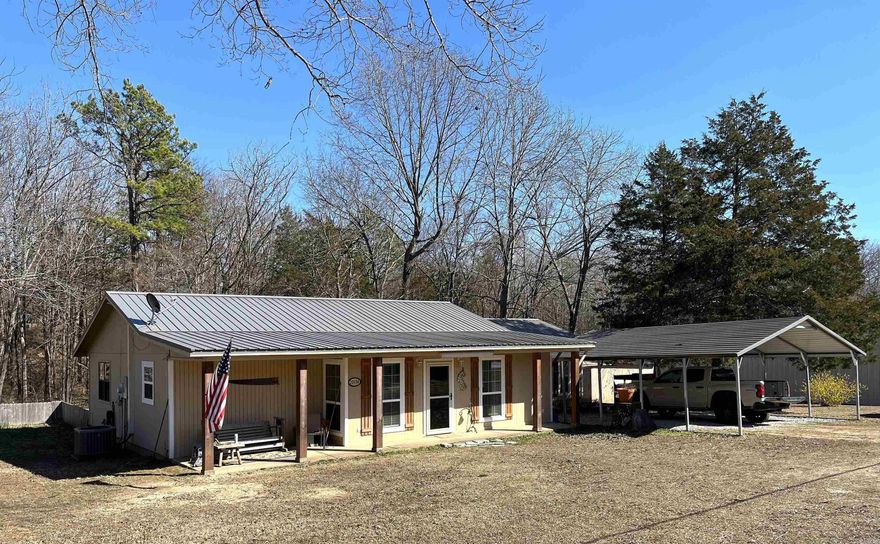 Well, maintained 3 BR/2 BA home located just a few miles north of Mountain View. The location is prime for buyers wanting to enjoy the national forest, White River, Folk Center and all the activities the Folk Music Capitol of the World has to offer. The home was built in 1994 featuring approximately 1694 sq/ft sitting on .99+/- acres. The living/dining area was extended in 2023 to add more usable space to this area. The kitchen appliances convey and there's ample number of cabinets and countertop space. The ensuite bedroom is very spacious with private access to the rear deck. The bath includes double sinks and a walk-in tile shower. The two guest bedrooms are large and comfortable with an adjoining bathroom. Each bedroom has its own access to the back porch. Outside is a portable carport, a lean-to carport and a storage building. Great place with easy access off Hwy 5.