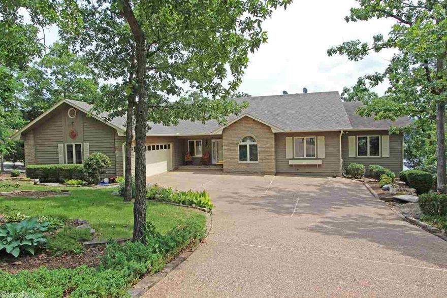 Gorgeous 1 level home on a very gentle sloped Lake Balboa lot with breathtaking views! All hardwood or tile floors throughout home. Heat pump replaced in April 2013. Covered boat dock with lift and deck. Kitchen has granite counter tops and island with Jenn Aire downdraft cooktop. Sunroom and office off master bedroom. Covered and open deck. Heated and cooled hobby room lower level. Green house. Sprinkler system fed from lake. Tons of storage. Oversized 2 1/2 car garage!