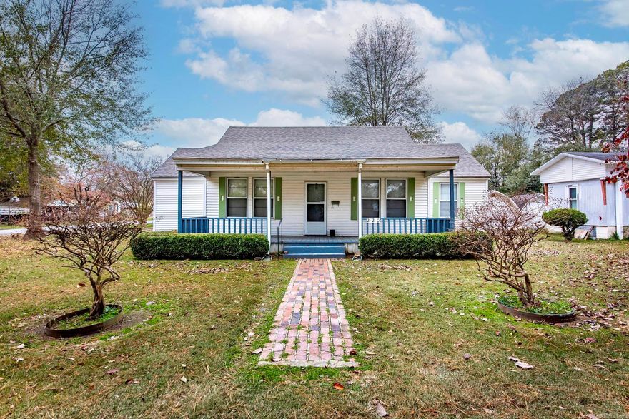 Charming Corner Lot Classic in the Heart of England – Newer Roof!  One family's home for over 50 years, this well-loved home has been a staple of the neighborhood, and now it is ready for its next chapter! Situated on a spacious corner lot in the heart of England, this 3-bedroom, 1-bath residence offers timeless character you just can't find in new construction.  Interior Highlights Step inside to find a kitchen that truly feels like home, featuring hand-built custom cabinets, beautiful tile countertops, and an adorable pantry with impressive storage space for all your canning and cooking needs. The bathroom has been refreshed with a brand-new walk in shower insert, offering modern convenience.  Exterior & Updates Peace of mind comes standard here with a NEWER ROOF (installed 2024). Enjoy the Arkansas weather on your choice of the covered front or back porch—perfect for morning coffee or evening relaxing.  Bonus Storage: Need room for toys? The property includes a large storage shed with ample room to park your 4x4, mower, and tools.  Don’t miss this solid, well-cared-for home. Schedule your showing today!  sqft approx measuring encouraged. See agents remarks