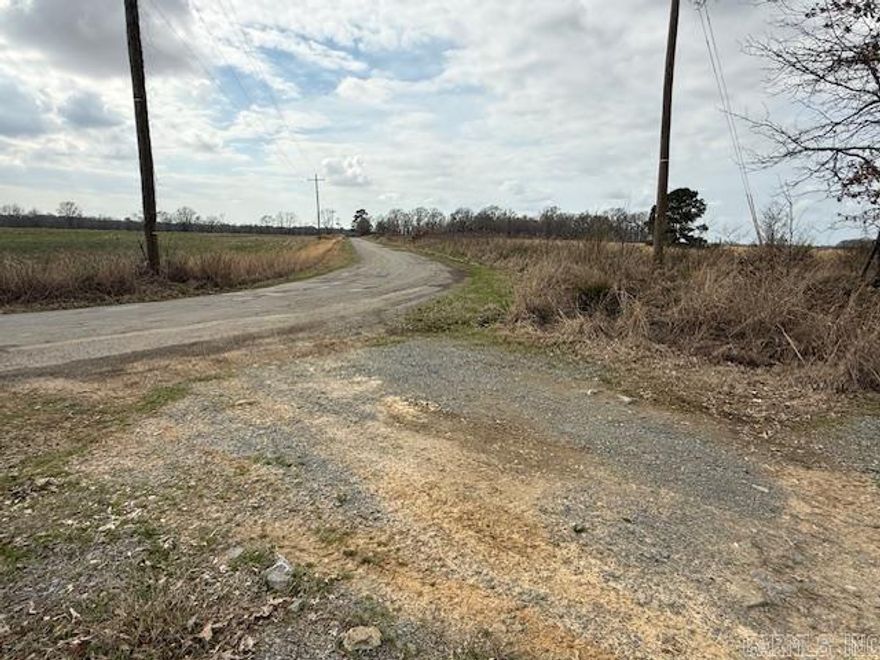 This 18 acre property has a home place already cleared and the pert test has been completed. Located on a paved road just 3 miles south of Carlisle. Rural water and electricity are right on the edge of the front section of the property. Your own timber is only a few steps behind your house place. This is a perfect private setting to build your home. Call and setup a showing.