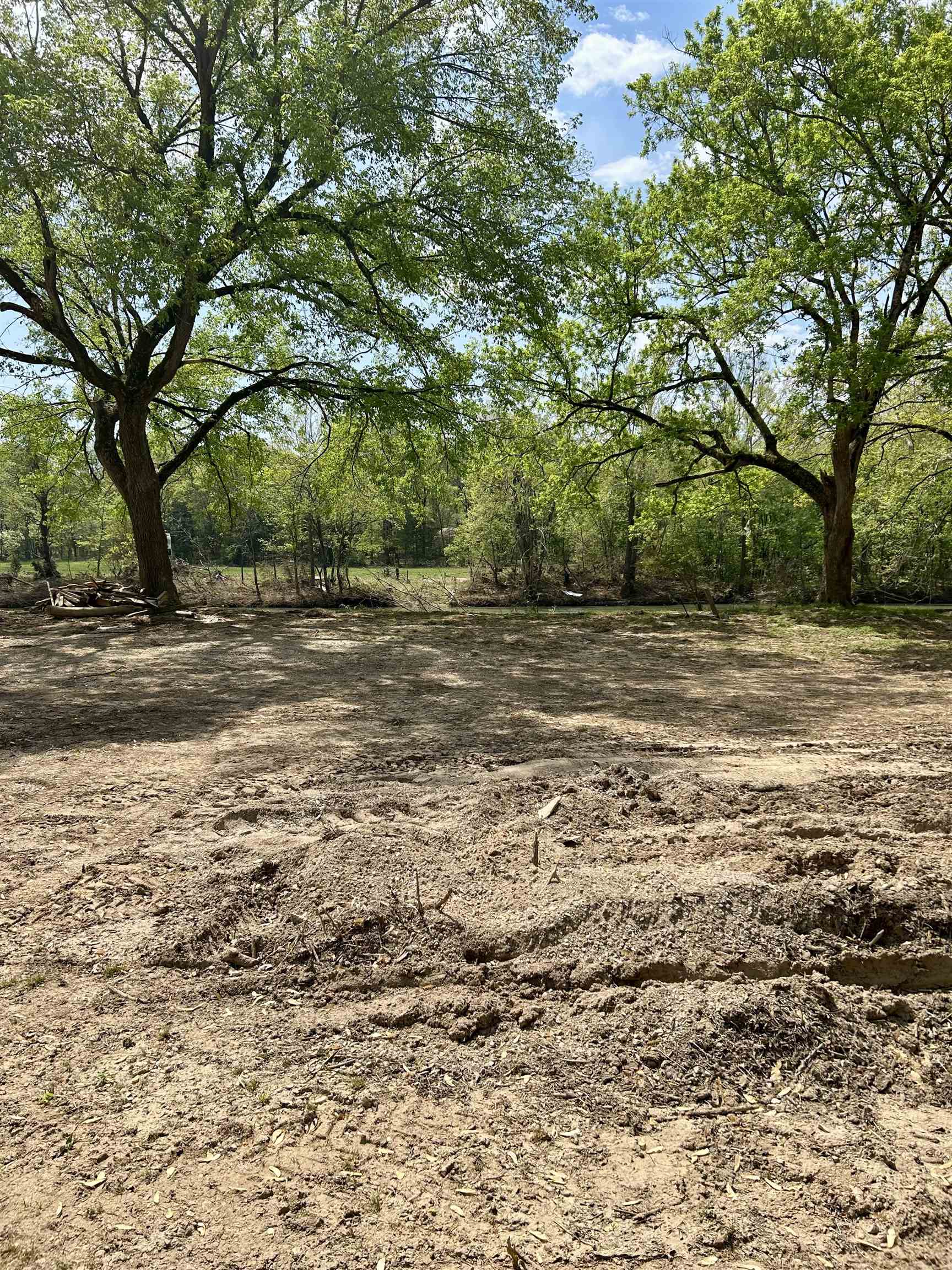 River front lot, gated camping park with water hook up and electric at road. The park also offers swimming beach and boat ramp along with swimming pool