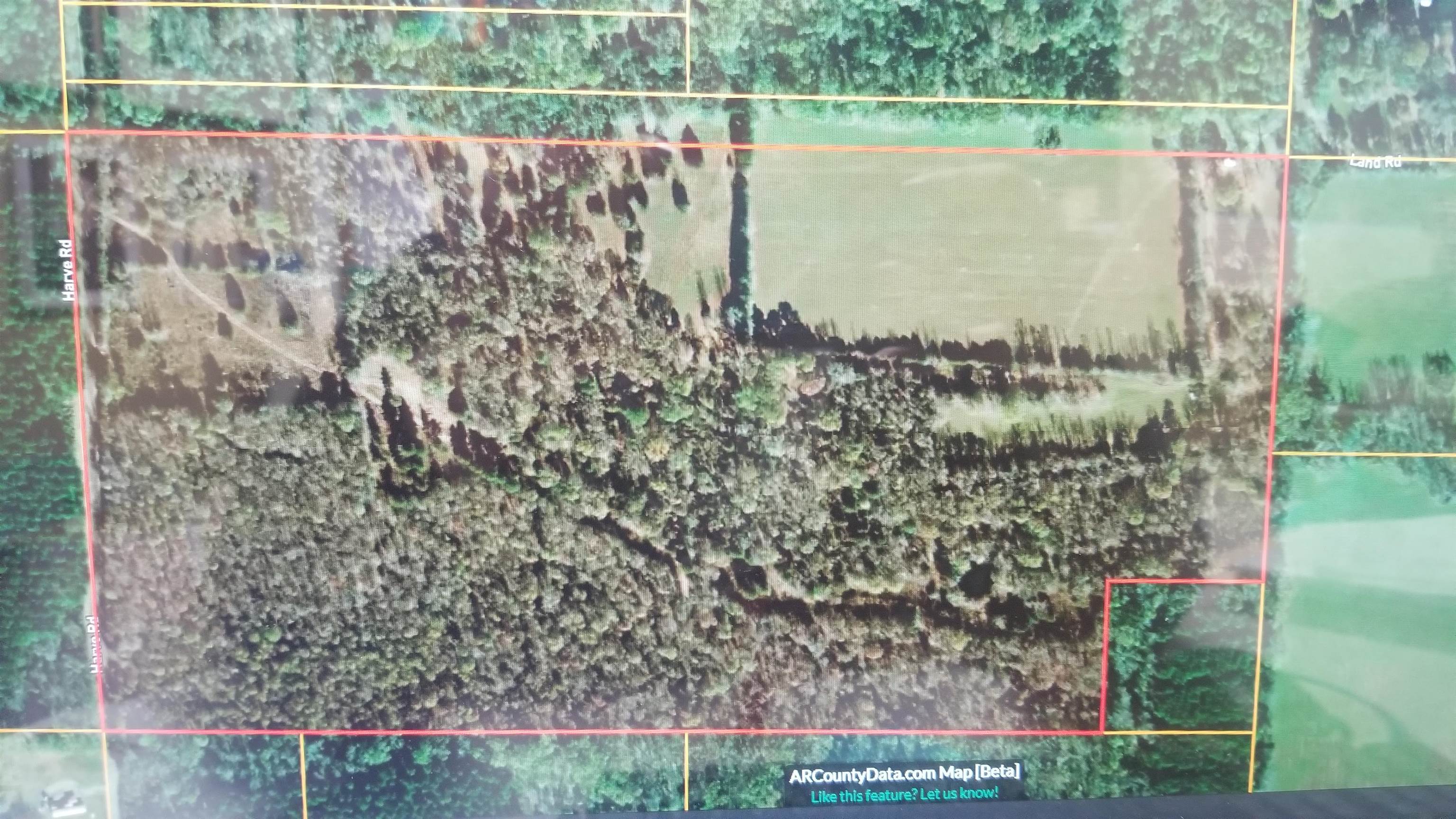 Gorgeous level and fenced in track of land with creek. LOTS of mature hardwoods and field space for grazing, bailing hay, hunting, or building your dream home. Does have electrical and well on the property. Property can also be entered in on the back side from Harve Road with a little bit of work. Close to Holland City Park. Possible mineral rights to convey. Seller is working on getting a current survey.