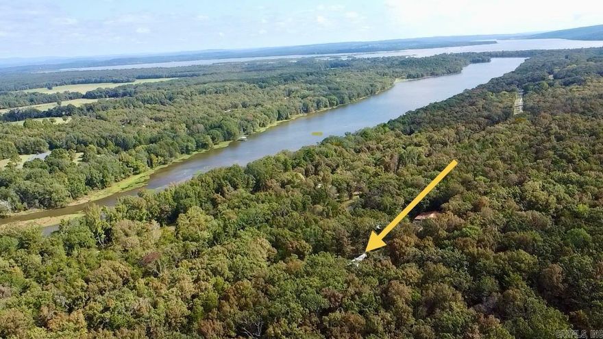 Perfect for fishing and outdoor lovers! This 2-acre property sits just 700 feet from Dublin Bay and only minutes from the Koch Landing Boat Launch at Thompson Bay—ideal for easy access to the water without the crowds. The land features a cleared home site with established shade trees, a wooded buffer for privacy, and level terrain with great access. AV Electric and a Scranton Water Meter are on site (just a $100 deposit to activate), with a septic system believed to be in place. An old 521 sq. ft. mobile home remains on the property but is given no value. With no known restrictions, this private country setting is the perfect spot for your cabin, tiny home, or manufactured retreat near the water.