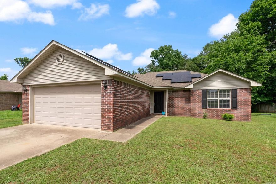 Beautiful home nestled among one of Conway's residential corridors, Favre Lane. Home's location provides access to many amenities without having to utilize the busier and adjacent Dave Ward Drive. Quick access to I40 is also available! This home has lovely floors, a nice back porch, and a large master bedroom. The living area is cute and cozy and adorned with a large fire place. The kitchen range has been upgraded to gas, but can be converted back. Purchase at sales price secures the new owner solar panels free and clear of any purchase contract setting them up for years of savings on their utilities. This home has so much to offer!