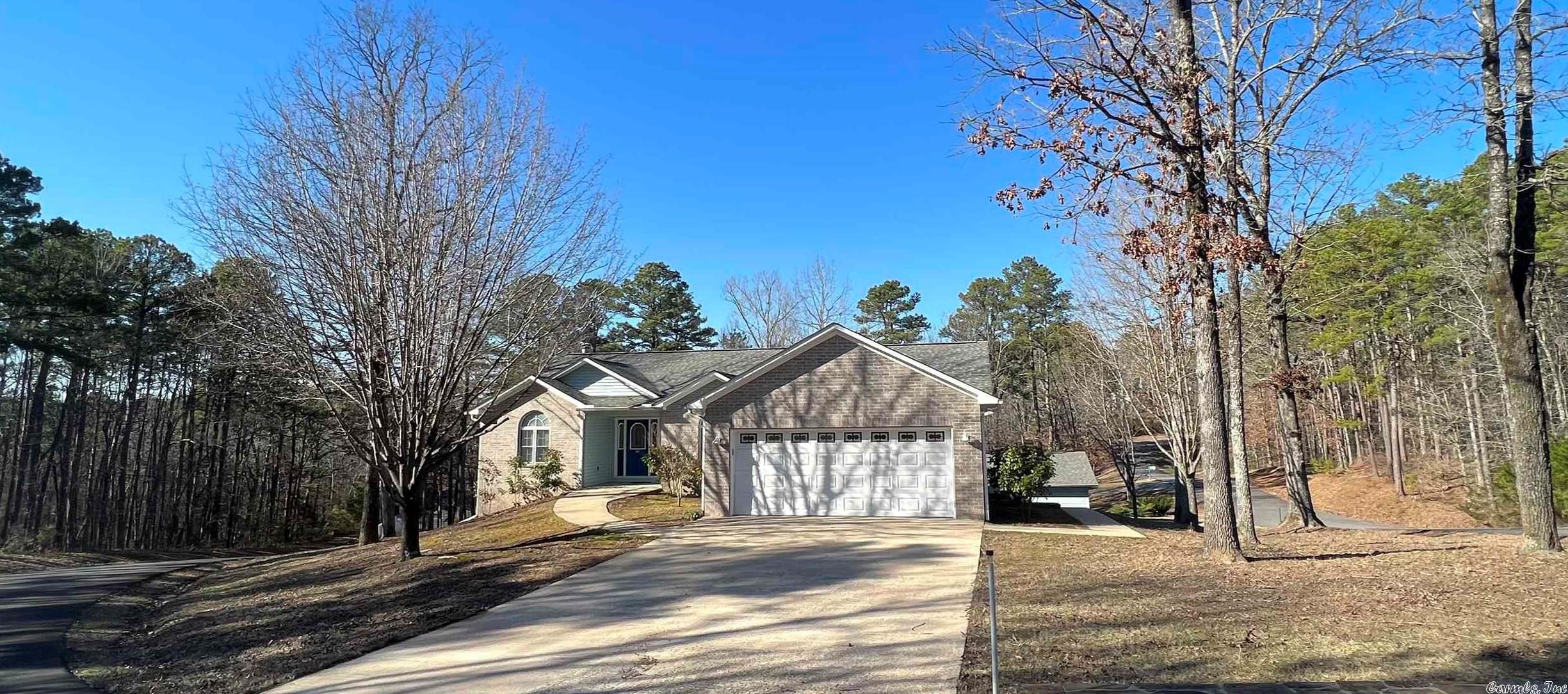 Welcome to market this well maintained large family home, over 3300 sq ft with a short walk away from recreation at Greers Ferry Lake and Devils Fork boat ramp & camping area. This home offers 4 beds 3 bths, two car garage, two laundry rooms, two kitchens, large walk in shower, open floor plan, real wood fireplace & propane back up heat, Downstairs can be can be for a large family or family game room. Walk in storm shelter and tons for storage for preppers, live close to the lake w out the lake front $$$